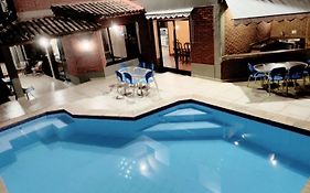 BEACH HOUSE Unidade 3 - Casas de Praia Guarujá 90 Metros do Mar 4suites ar condicionado Wi Fi Piscina